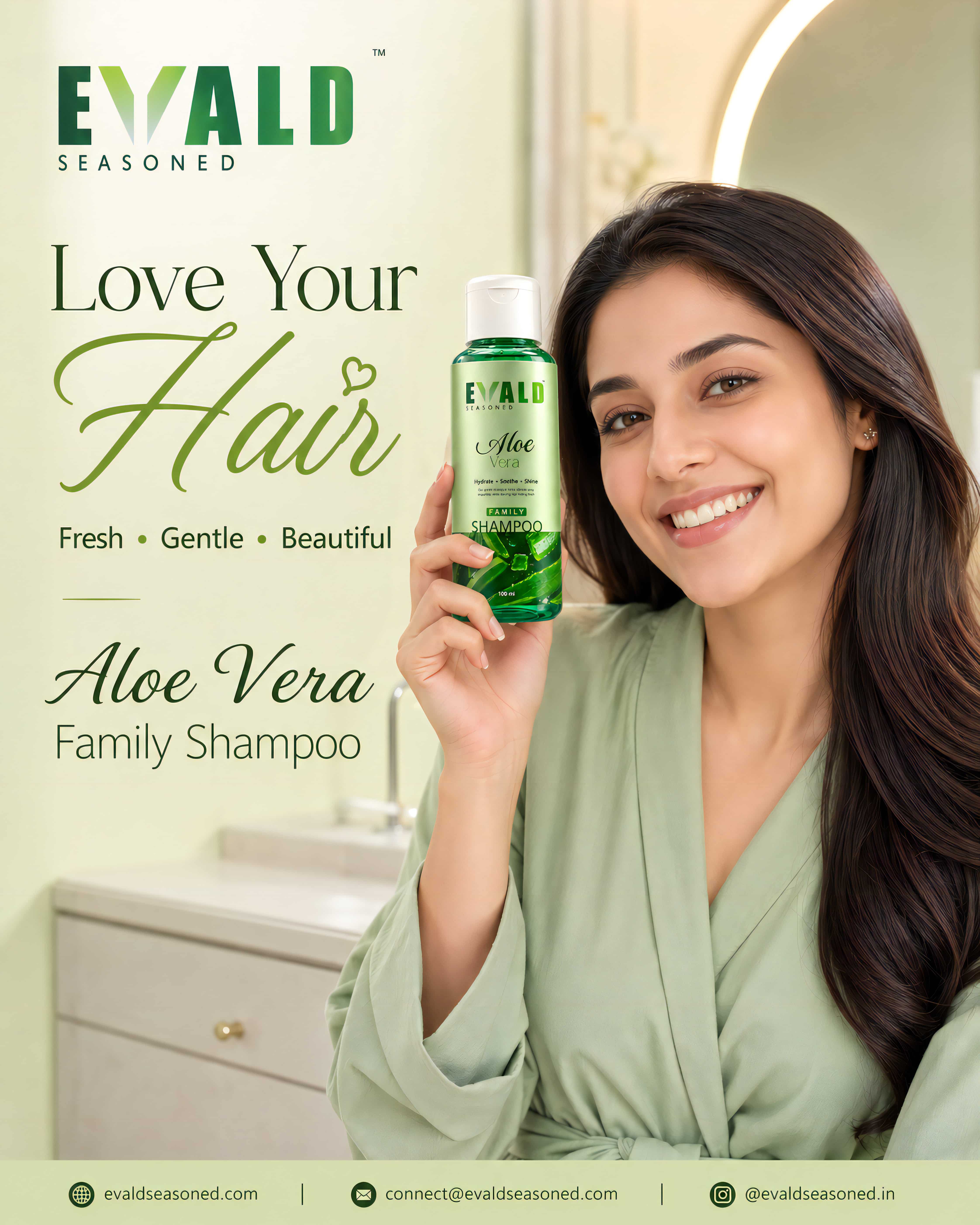 A woman with long hair holding the EVALD Seasoned shampoo bottle